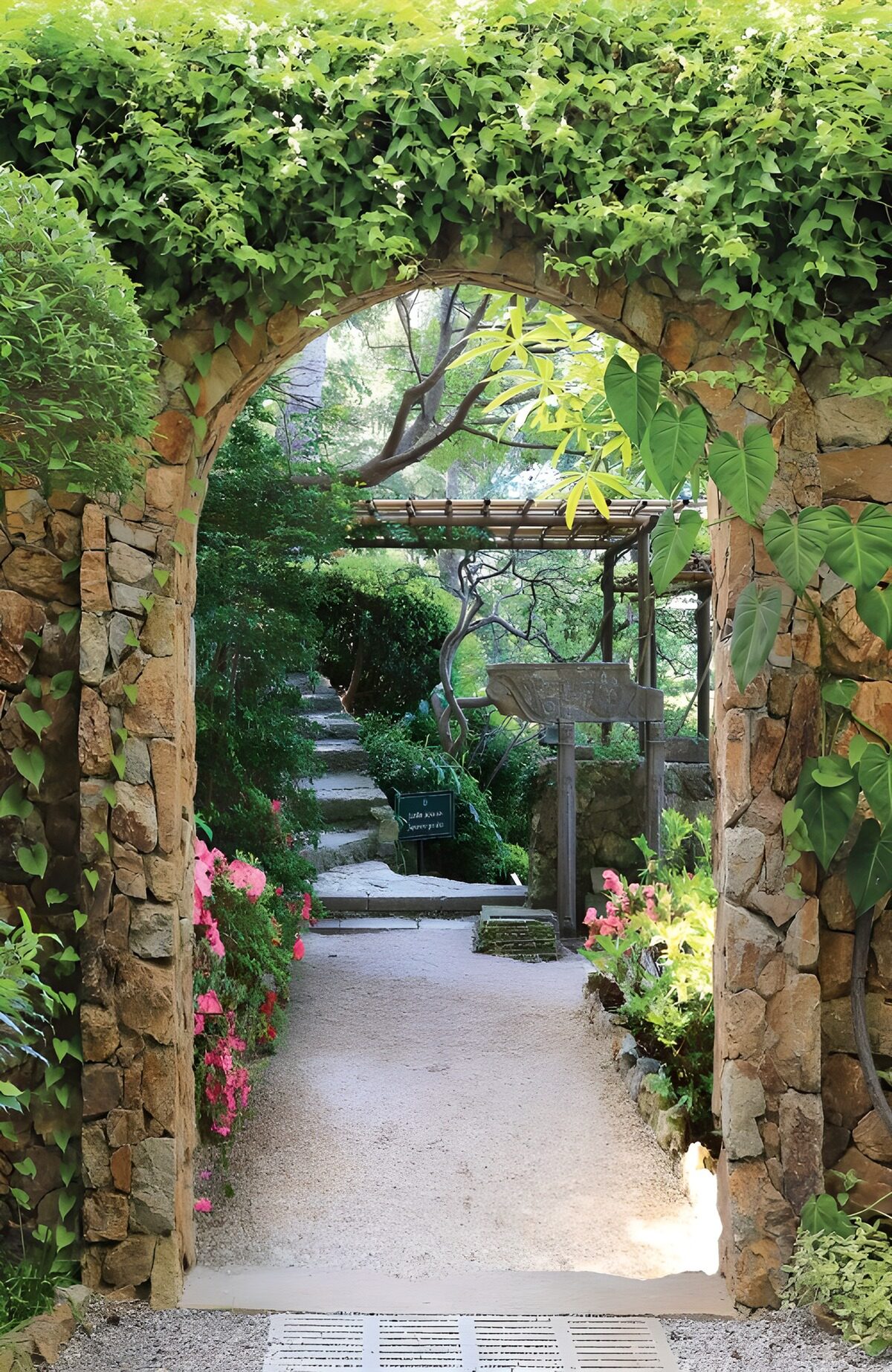 Stone arch and shaded garden path