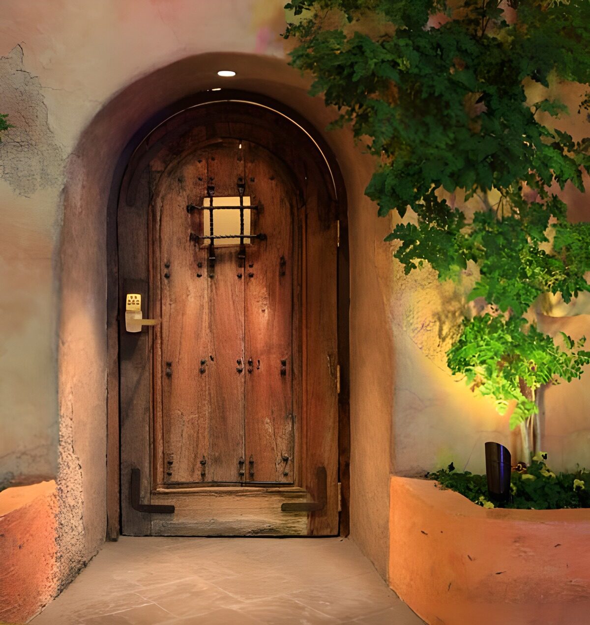 Weathered wooden door in warm peach plaster