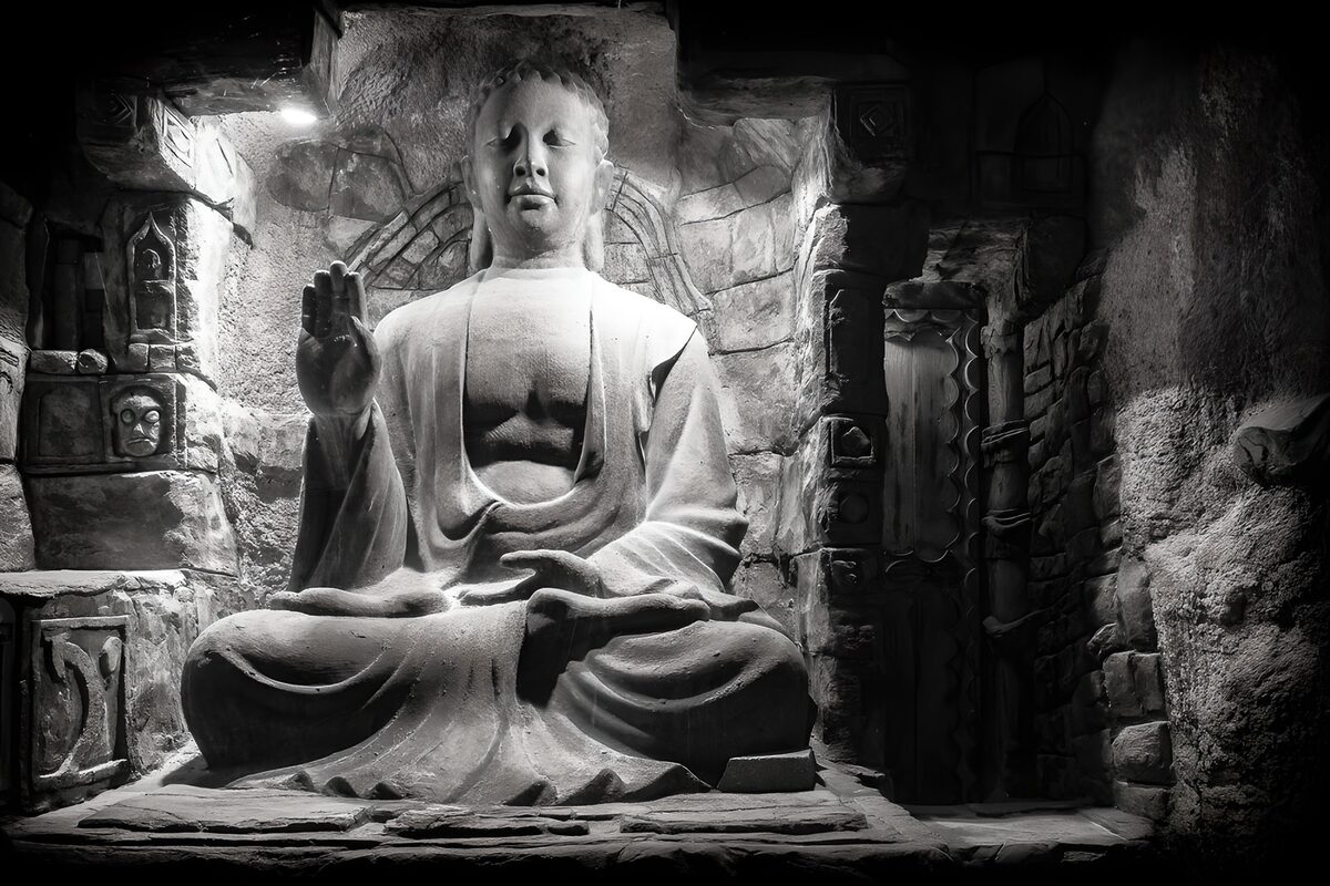 Stone Buddha in light and shadow