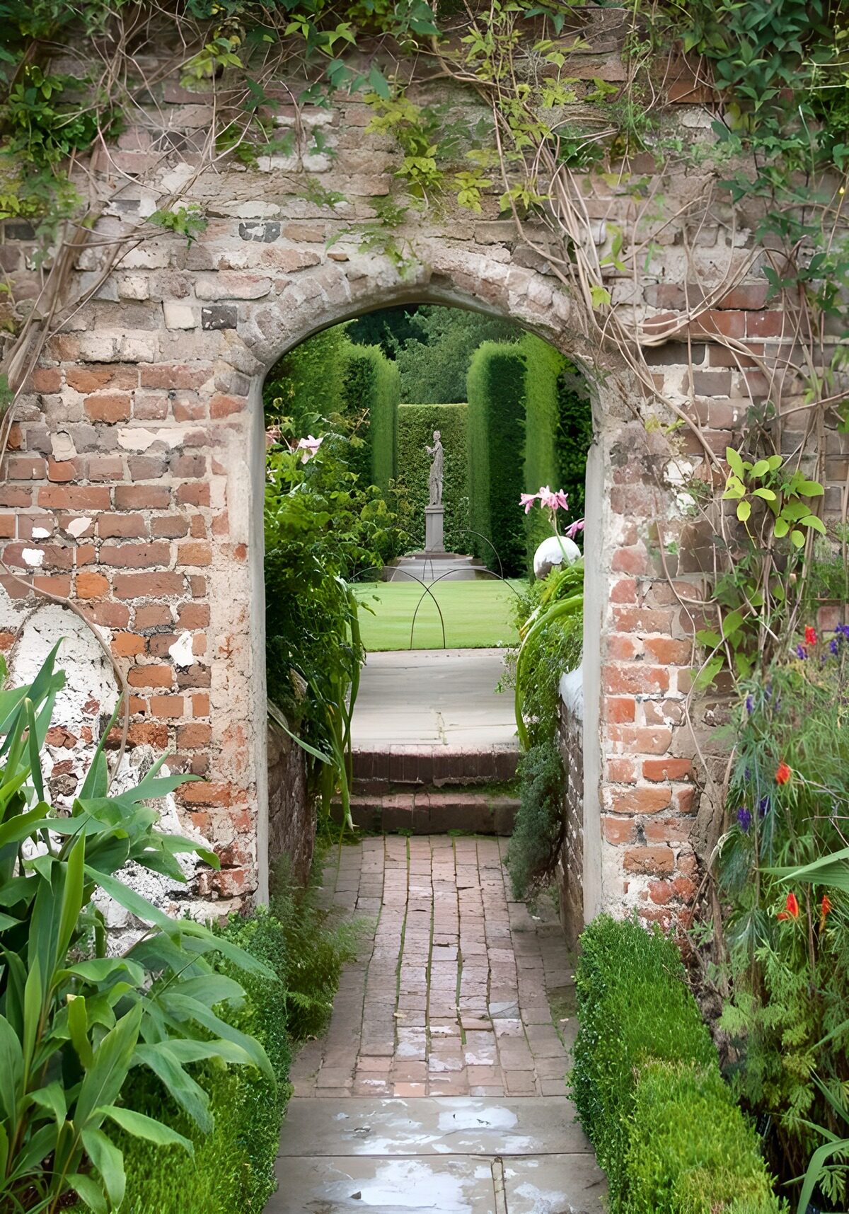 A brick arch into a quiet garden