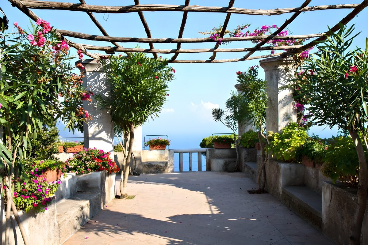 Sunlit pergola terrace by the sea