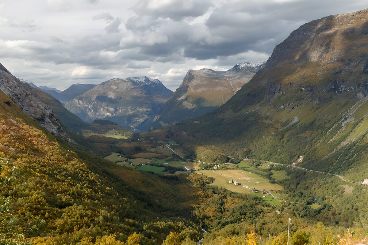Autumn fields in a sunlit mountain valley