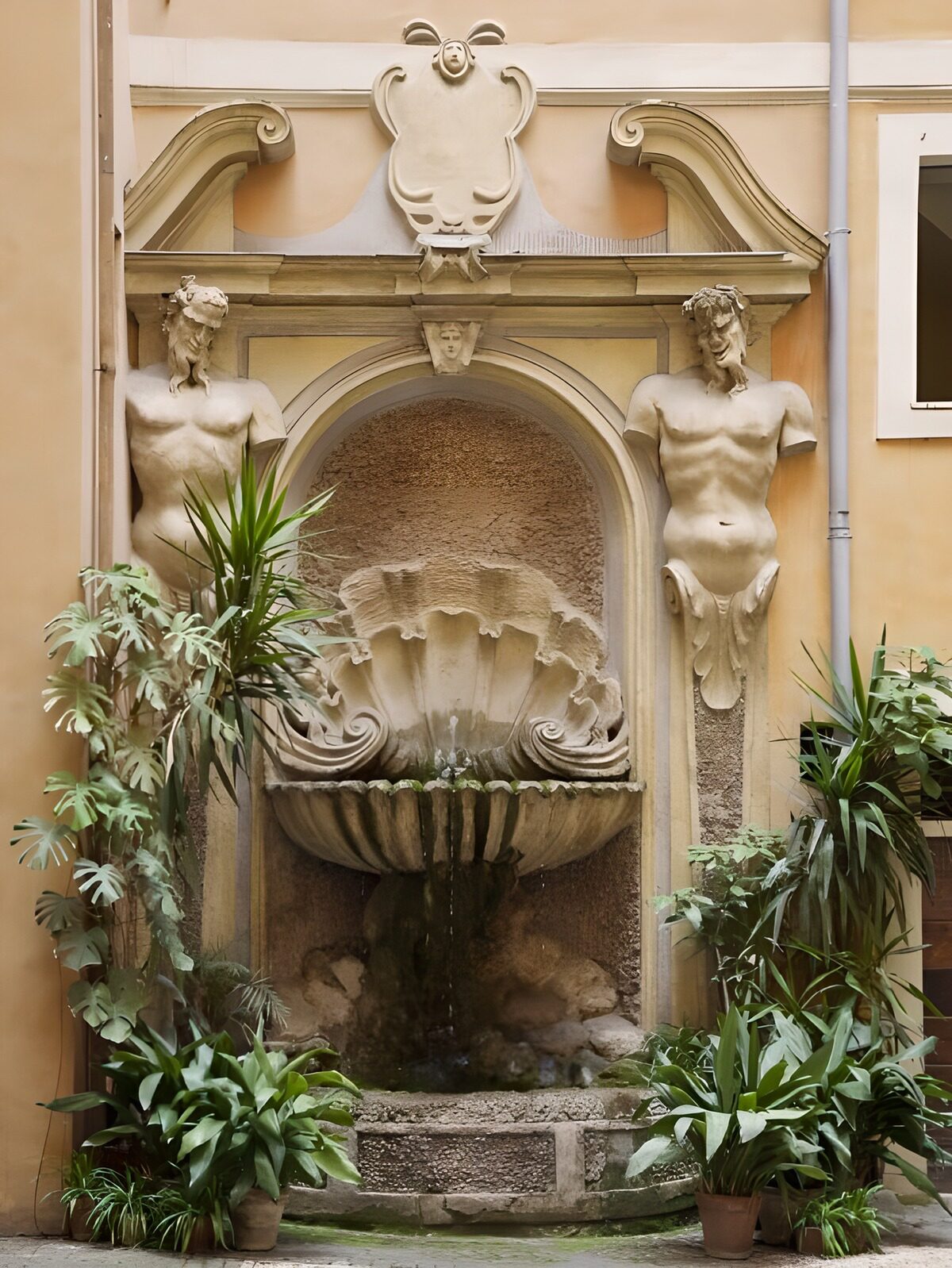 Ornate stone fountain framed by greenery