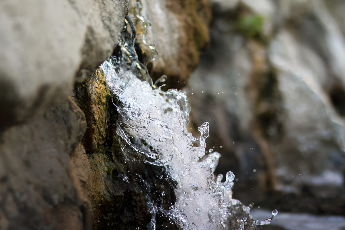 Water splashing over rugged rocks