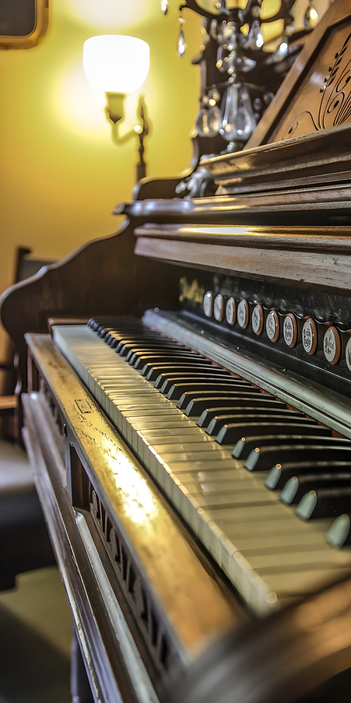 Antique harmonium in warm lamplight