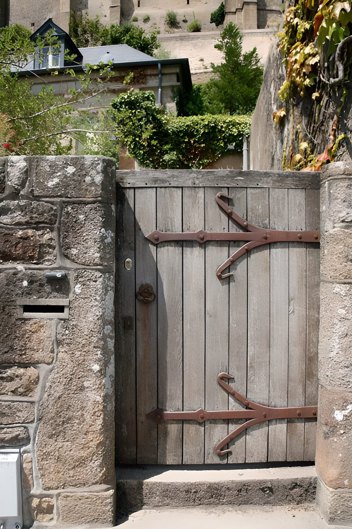 Weathered garden gate in sunlight