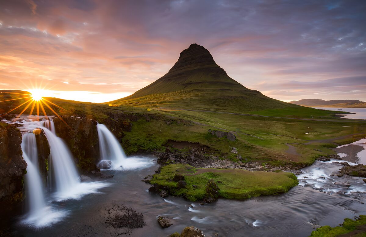Mountain and waterfalls in the sunset