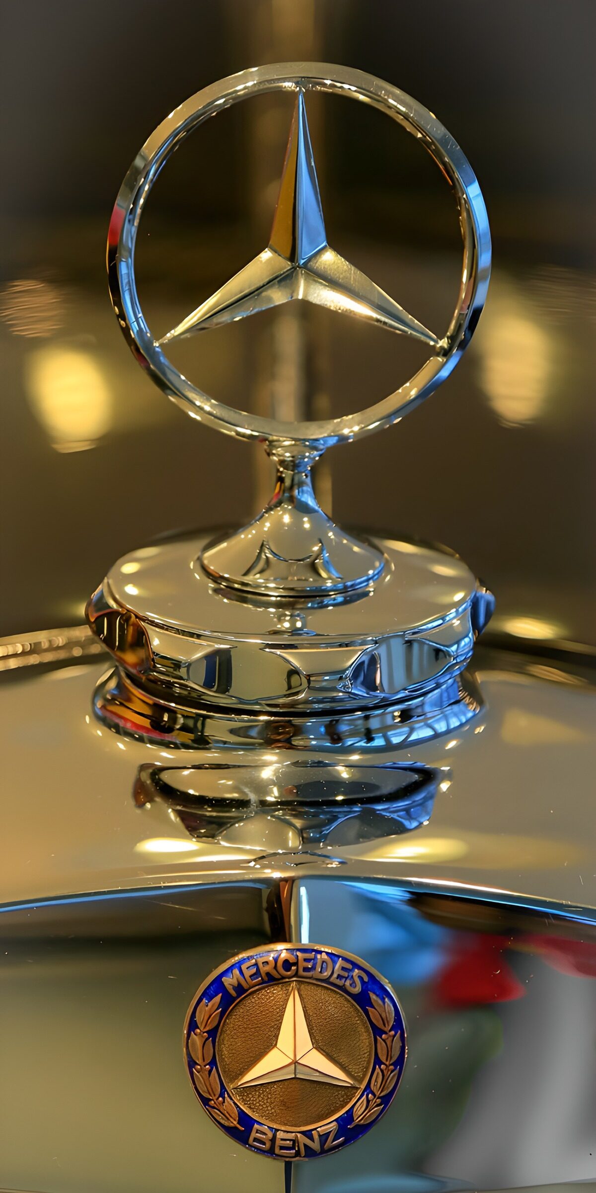 Chrome bonnet star in warm light
