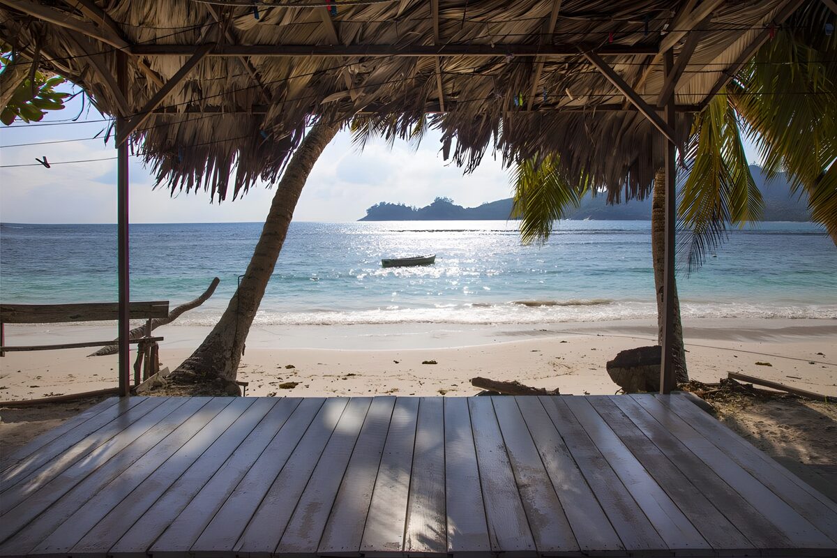 Tropical beach from a shaded hut