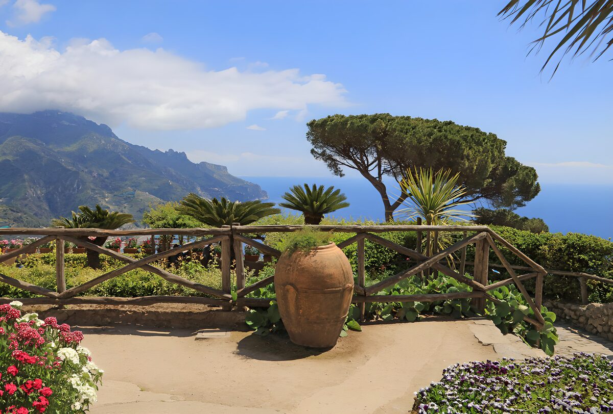 Sunlit garden terrace above the sea