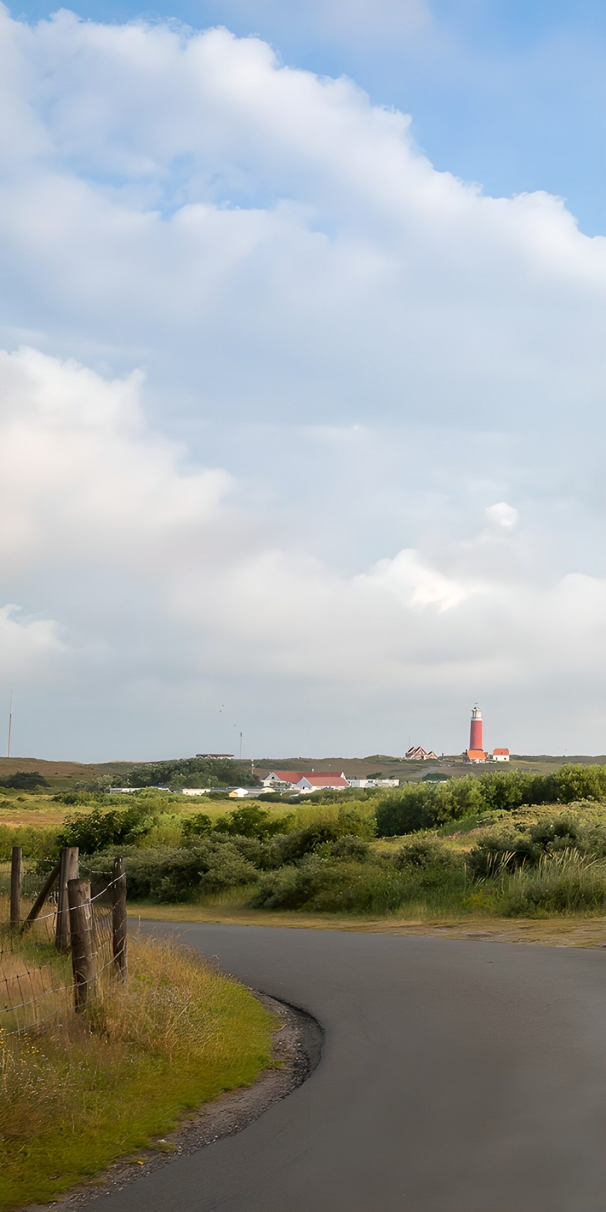 Curving road to the red lighthouse