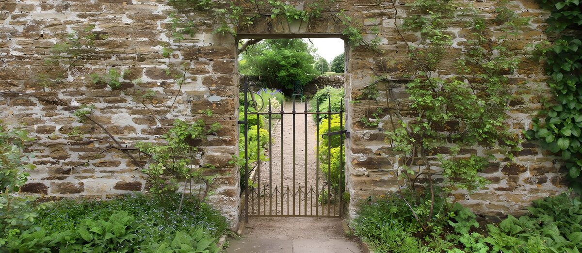 Old stone wall, quiet garden gate