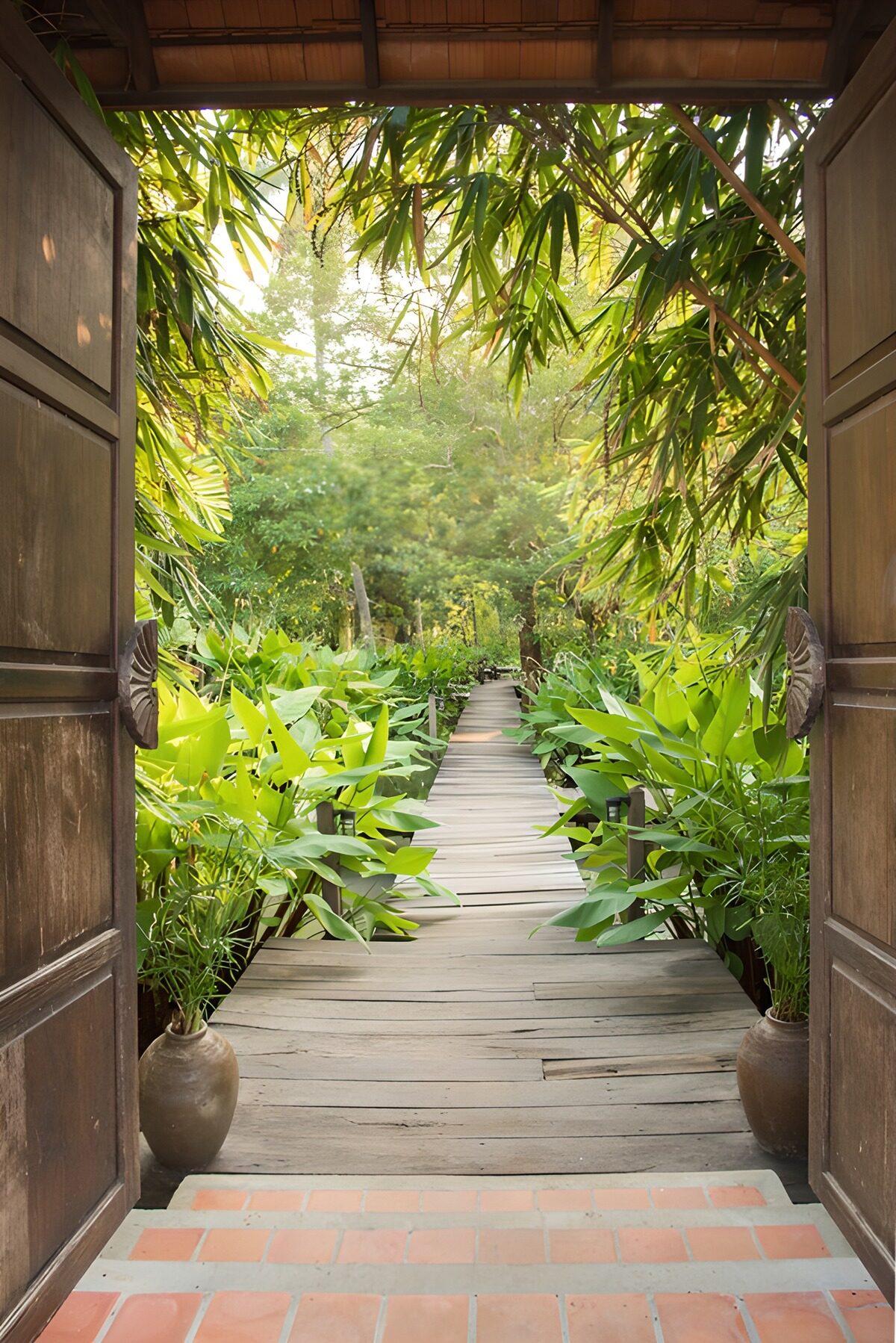 Open doors to a lush tropical garden