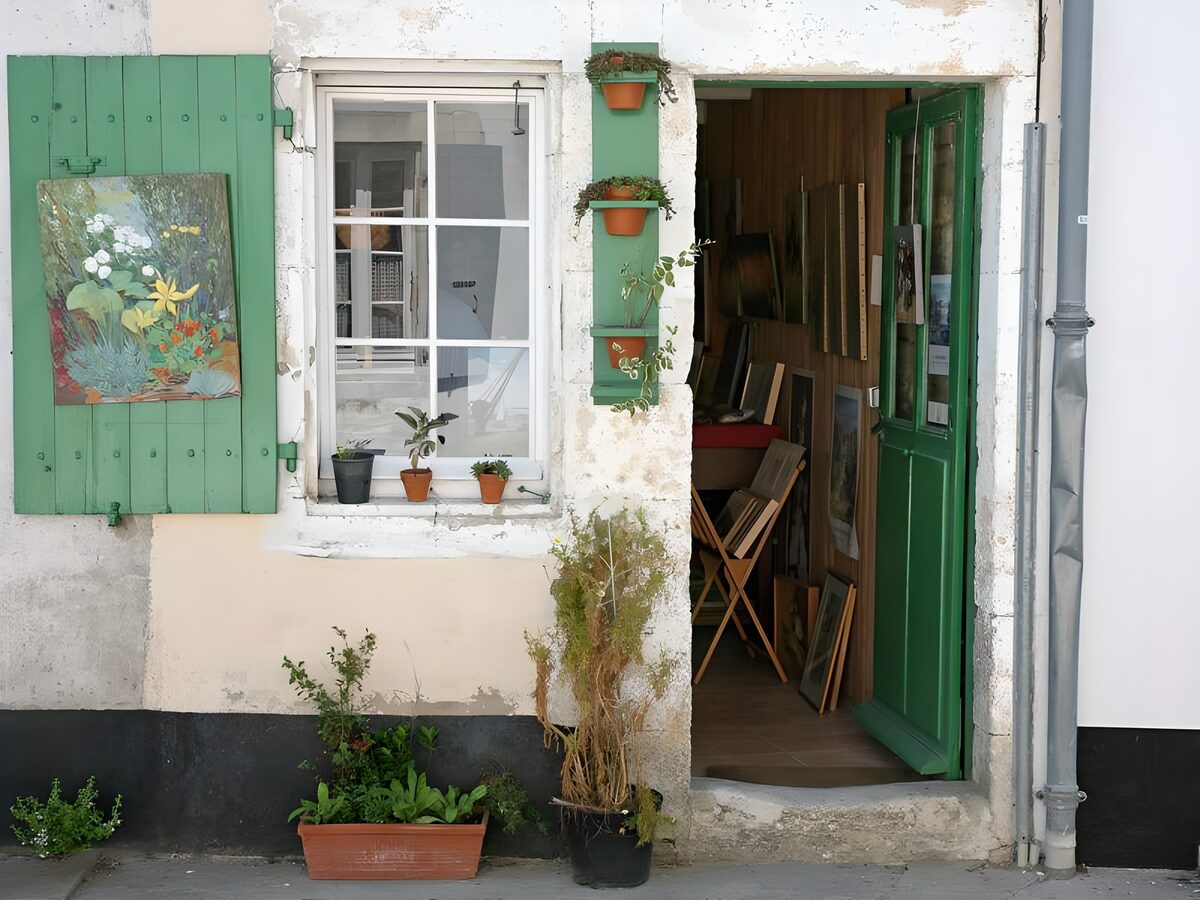 Green-shuttered studio in soft daylight