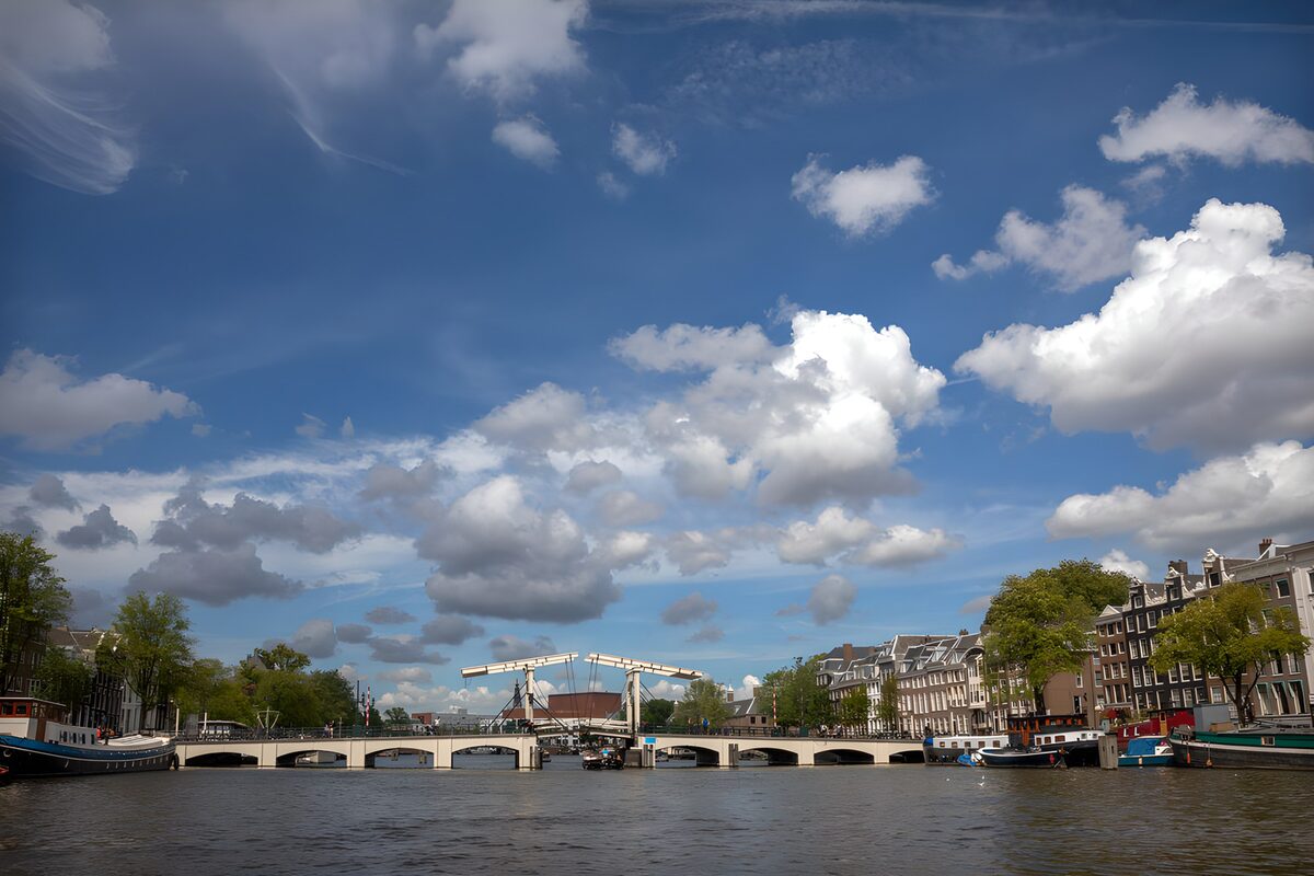 White drawbridge beneath a vast blue sky