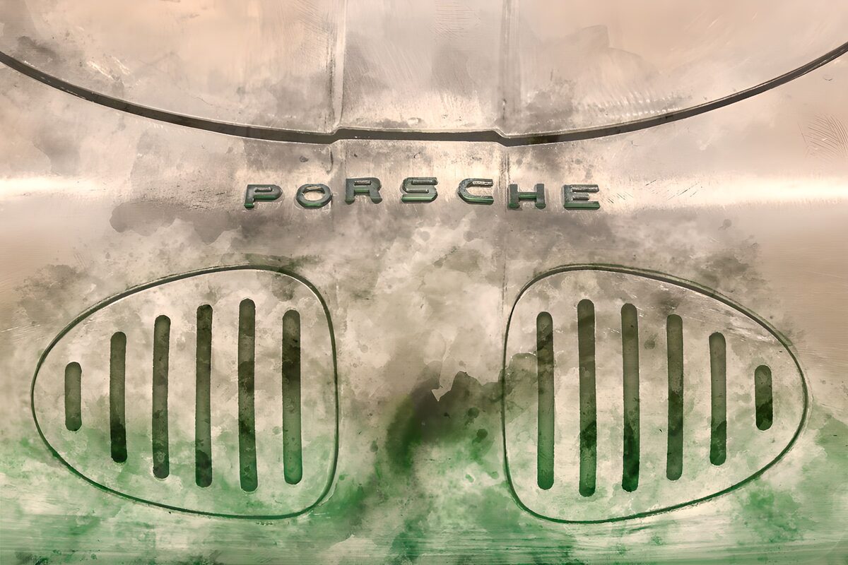 Weathered sports car with twin green grilles