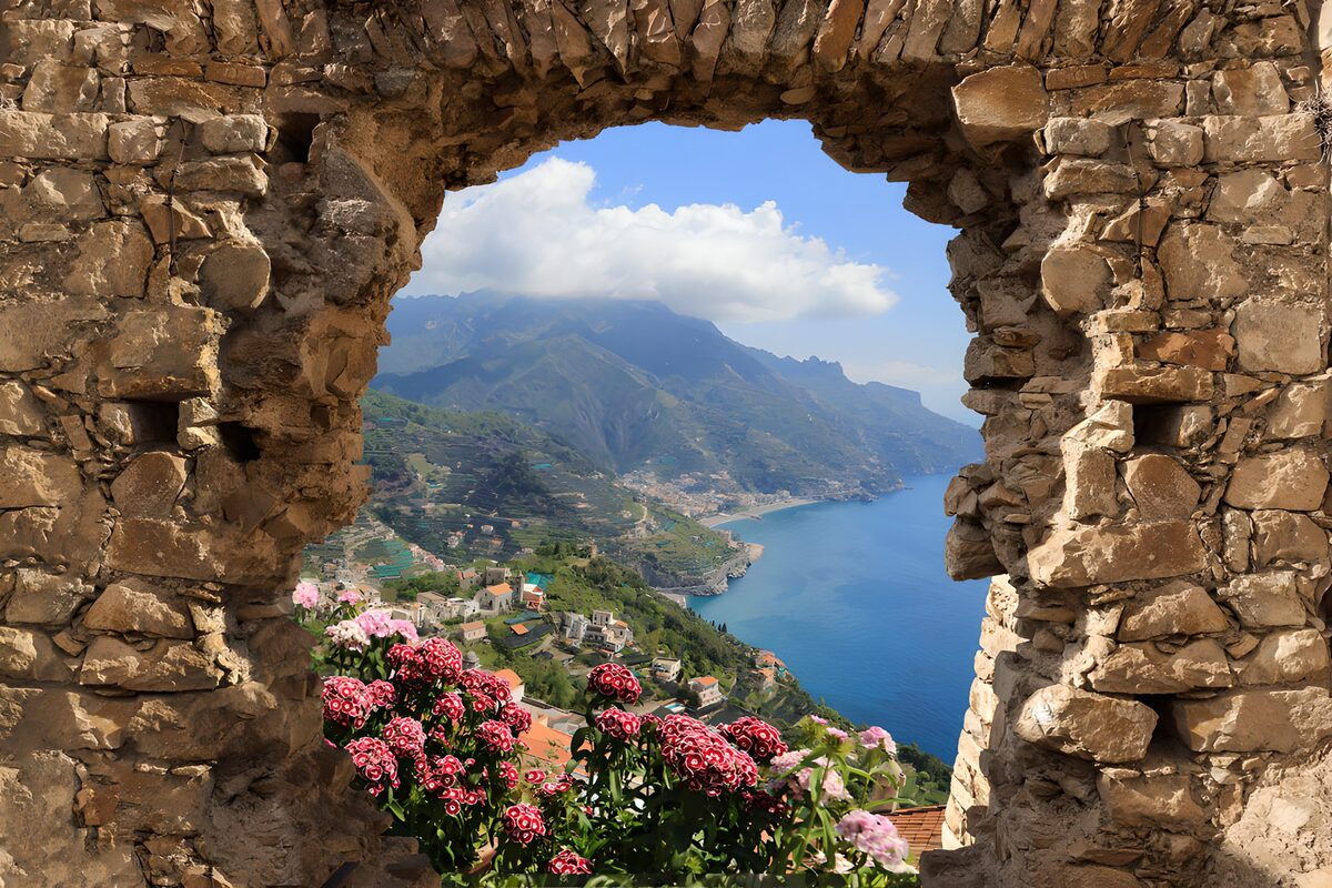 Sunlit bay through a weathered stone arch