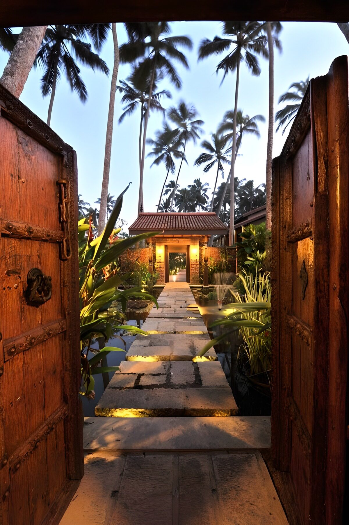 Tropical garden gates at twilight