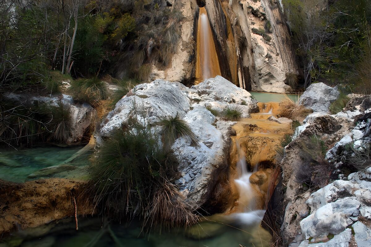 Waterfall and pools in a rocky hideaway