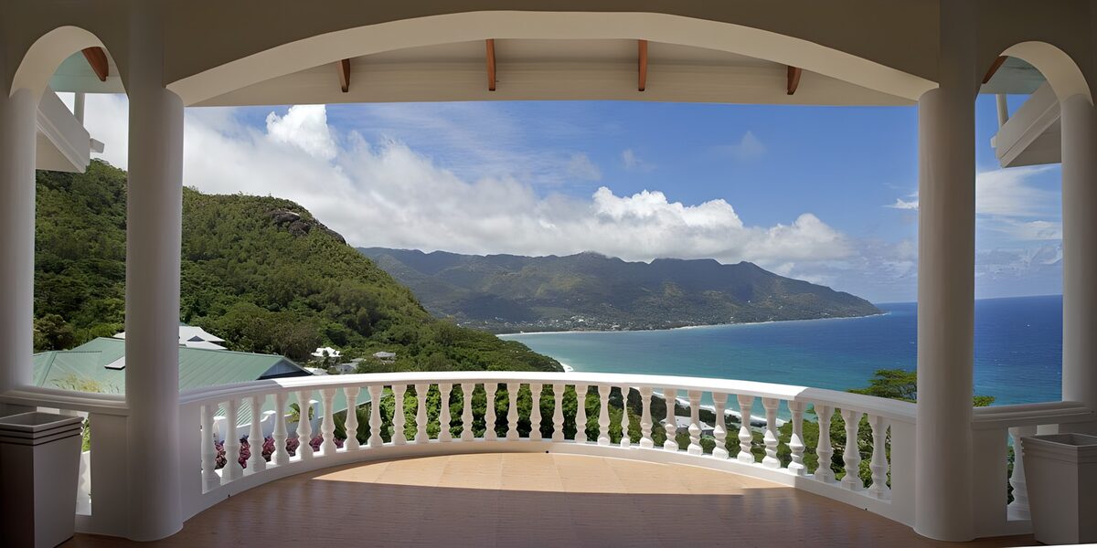 Shaded veranda overlooking a blue bay