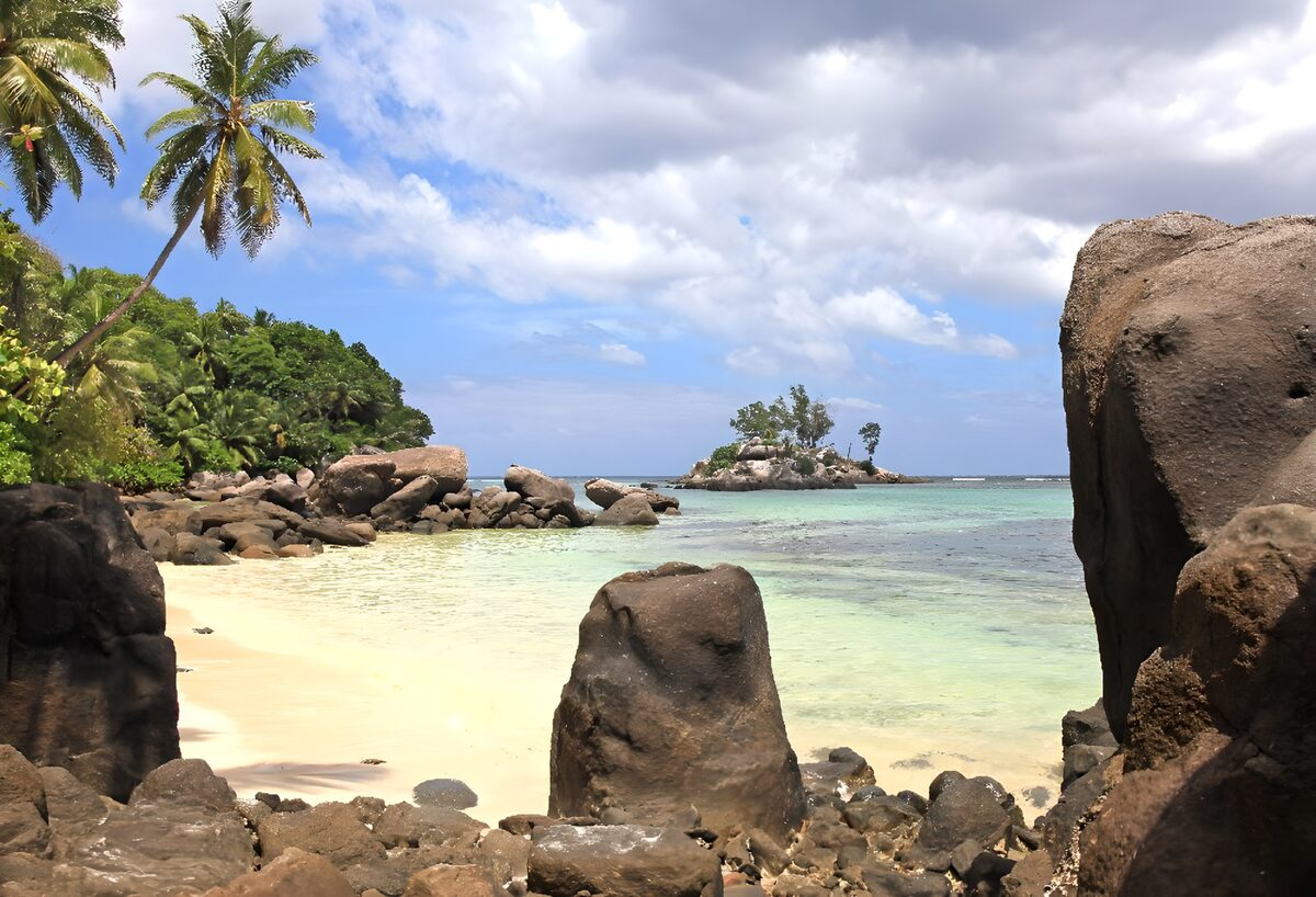 Sheltered beach with rocks and turquoise sea