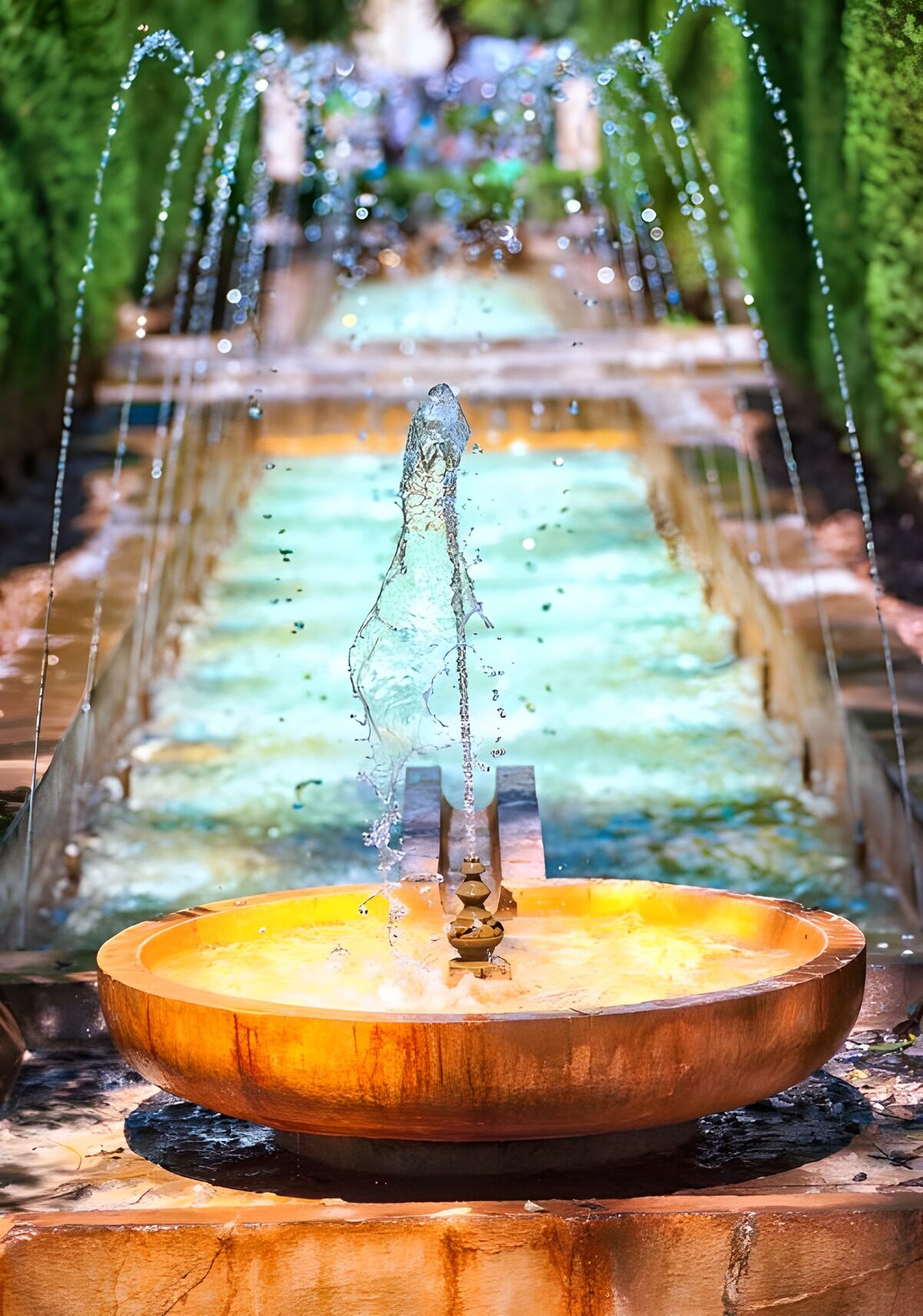 Sunlit fountain and stepped water channel