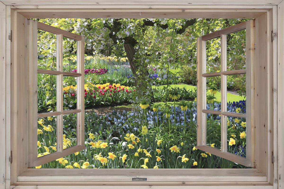 Open window onto a sunny spring garden