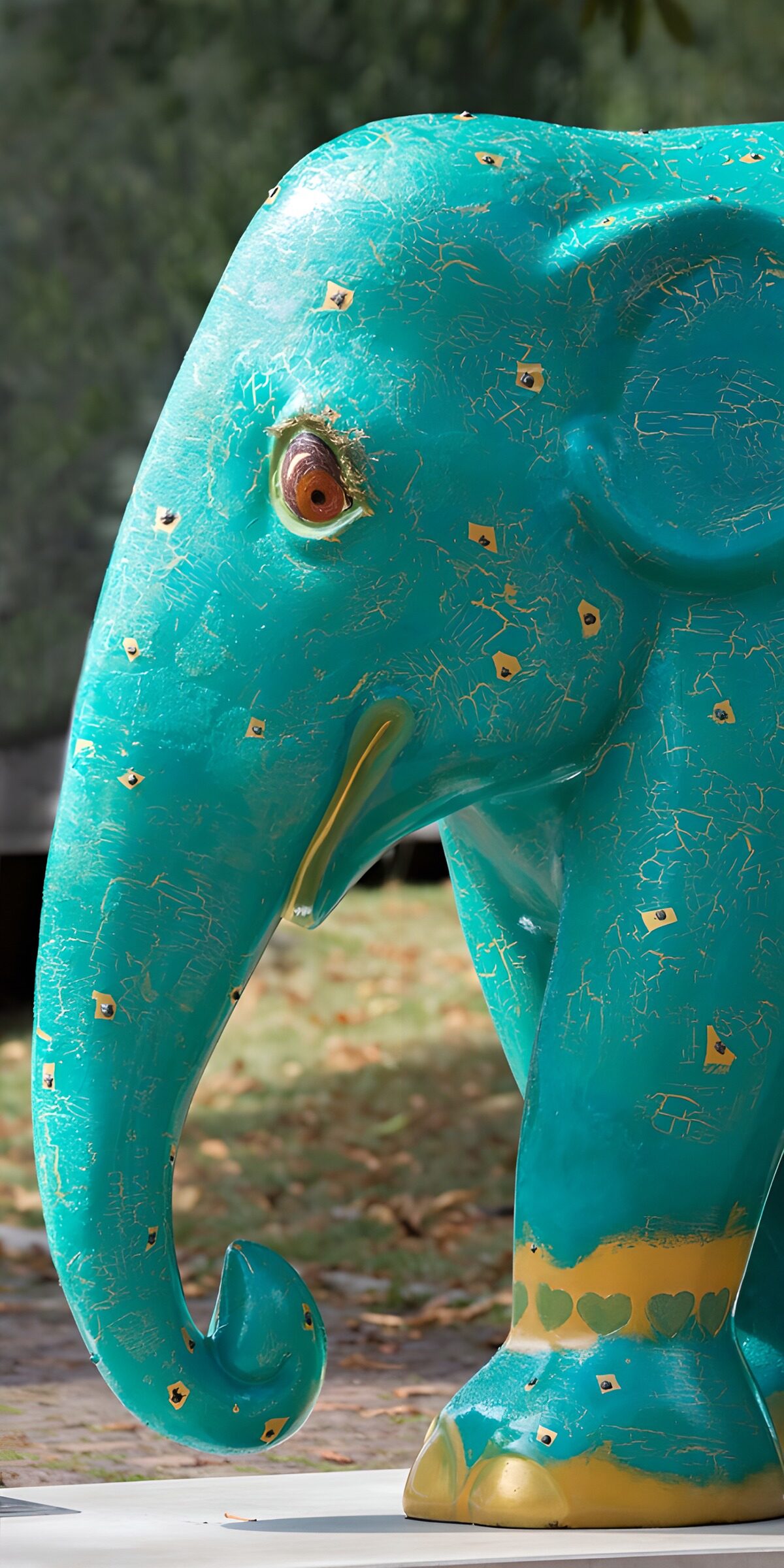 Weathered turquoise elephant statue