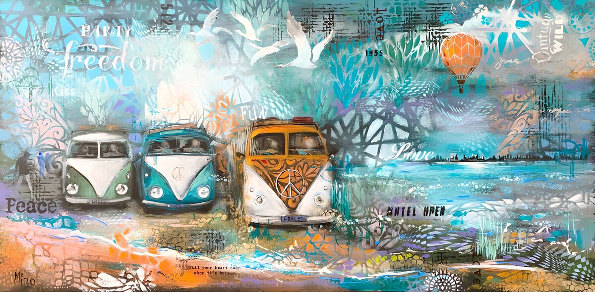 Three retro camper vans by the sea