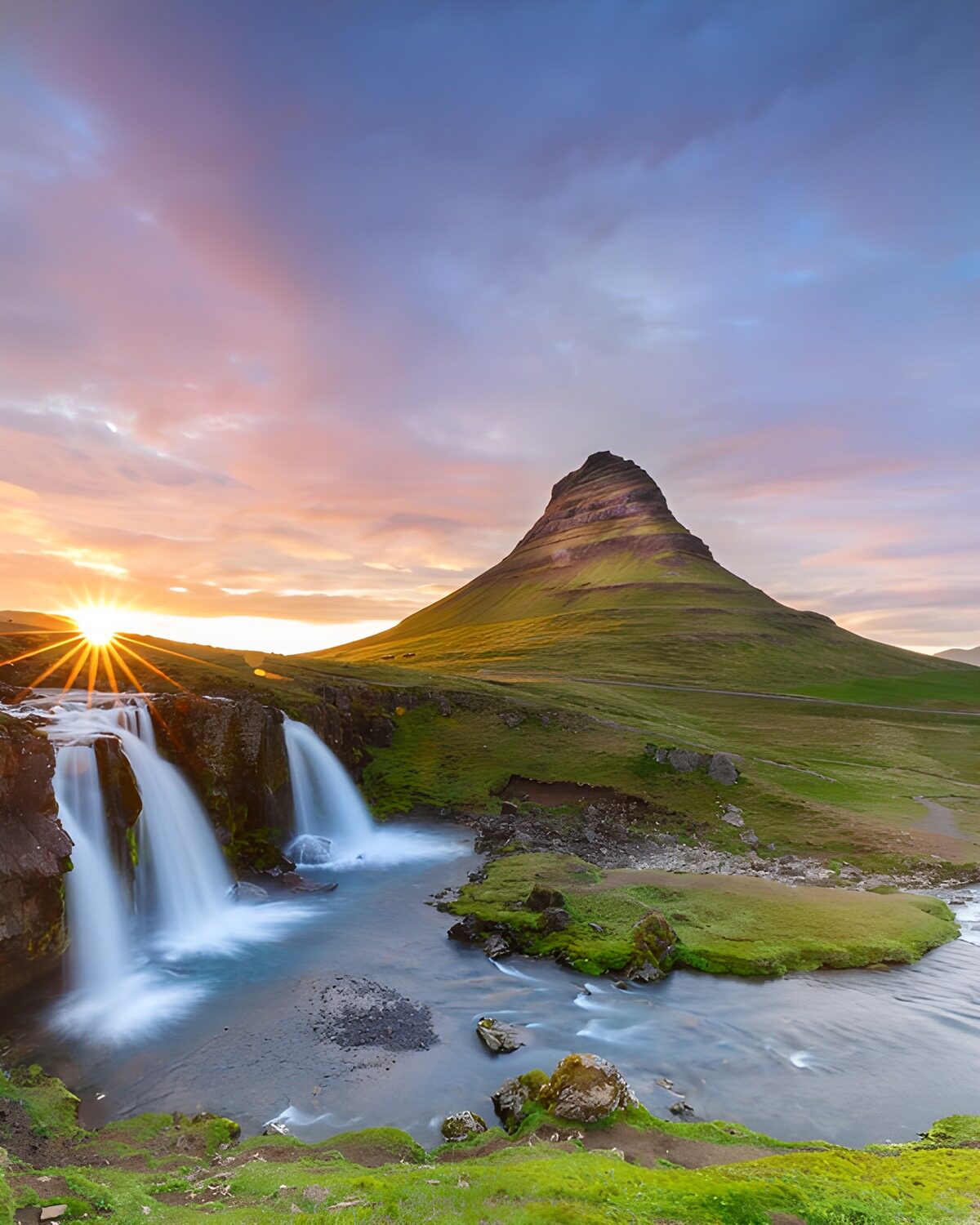 Waterfalls and Kirkjufell in golden light