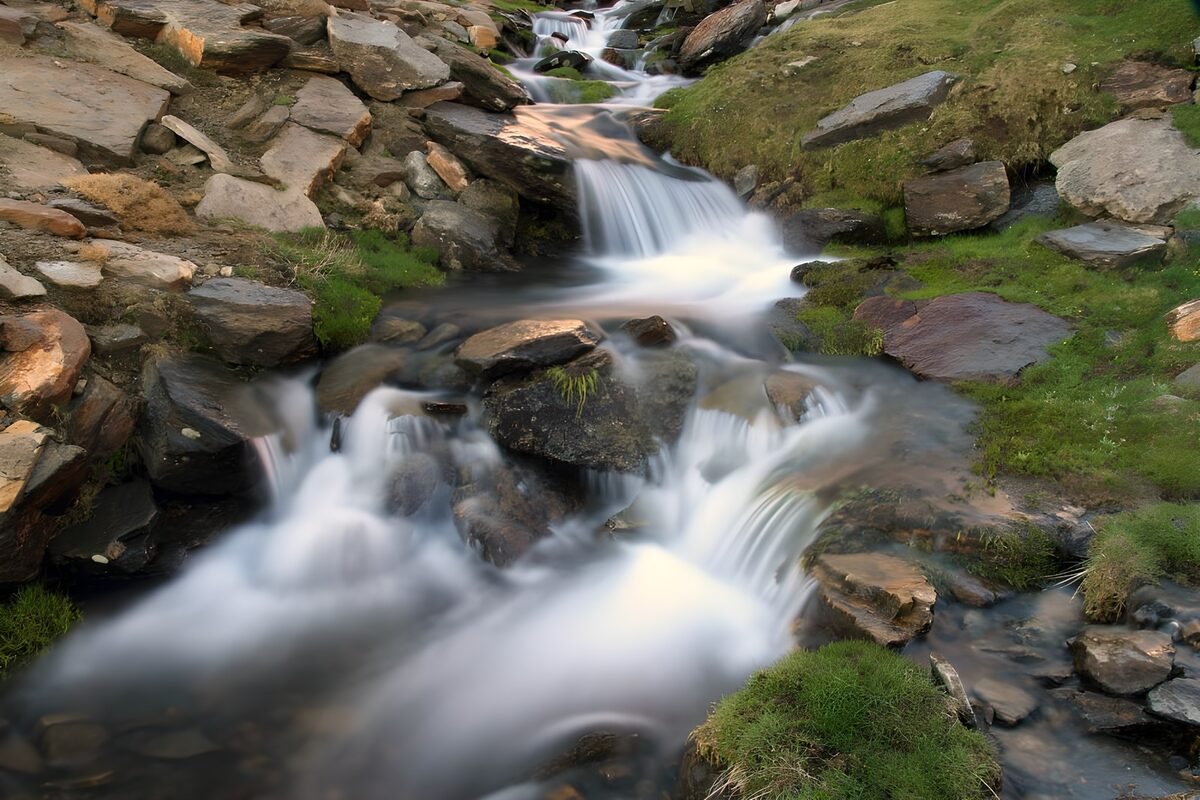 Rocky stream with soft white cascades