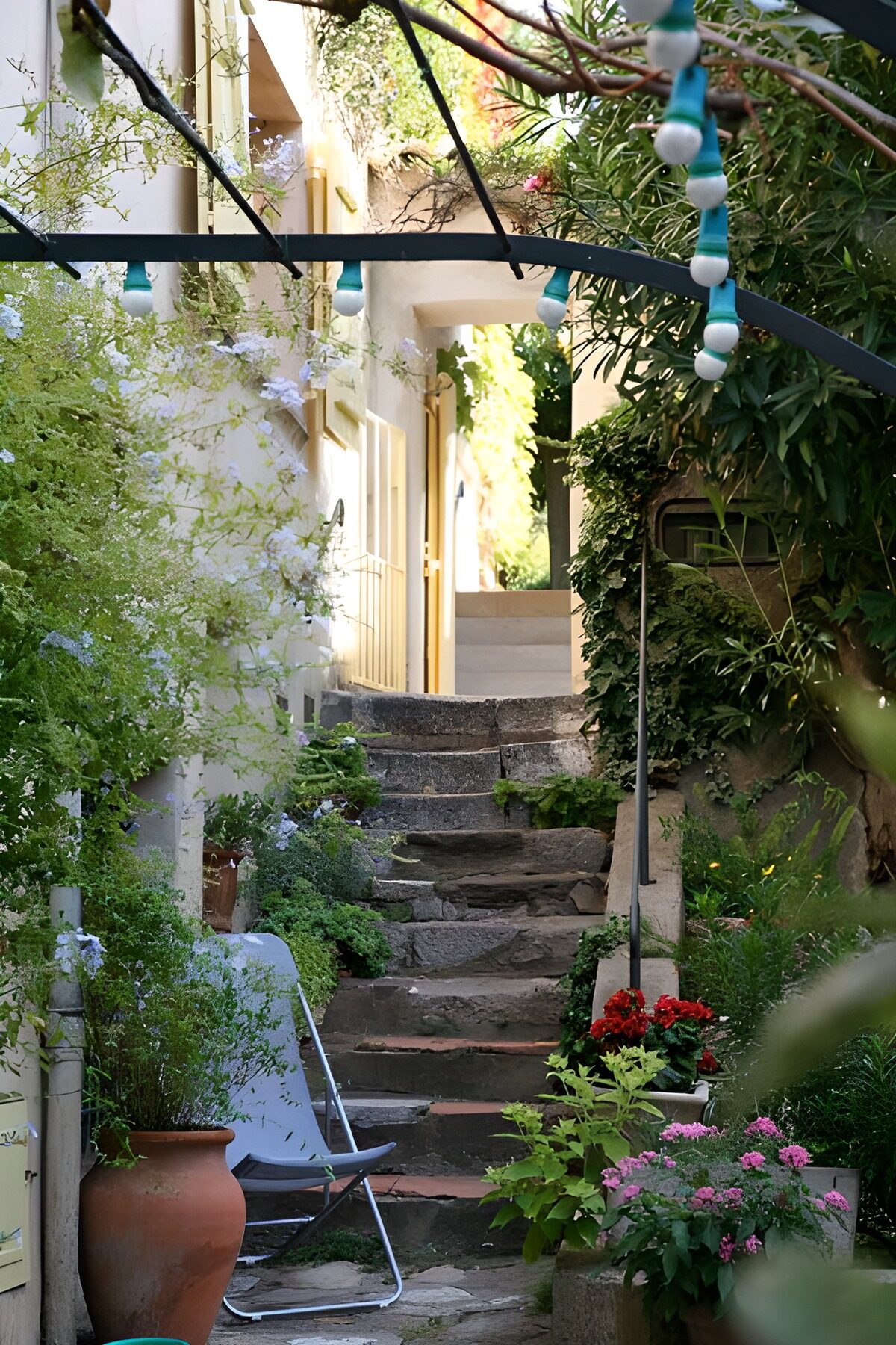 Quiet passage with flower-lined steps