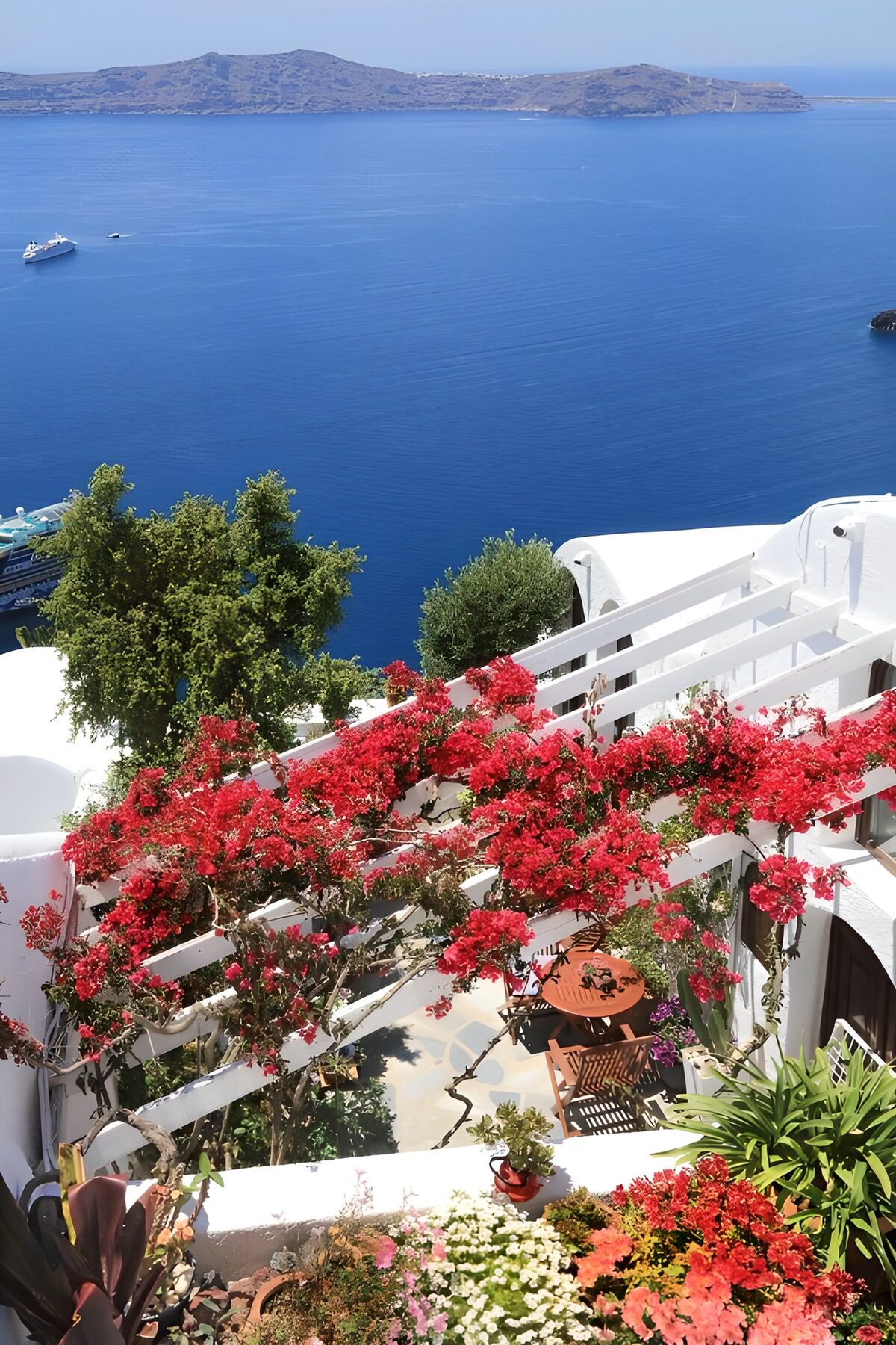 Flower-filled terrace above the blue sea