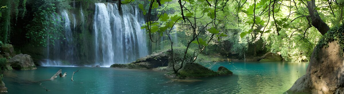 Waterfall and turquoise pool in the shade