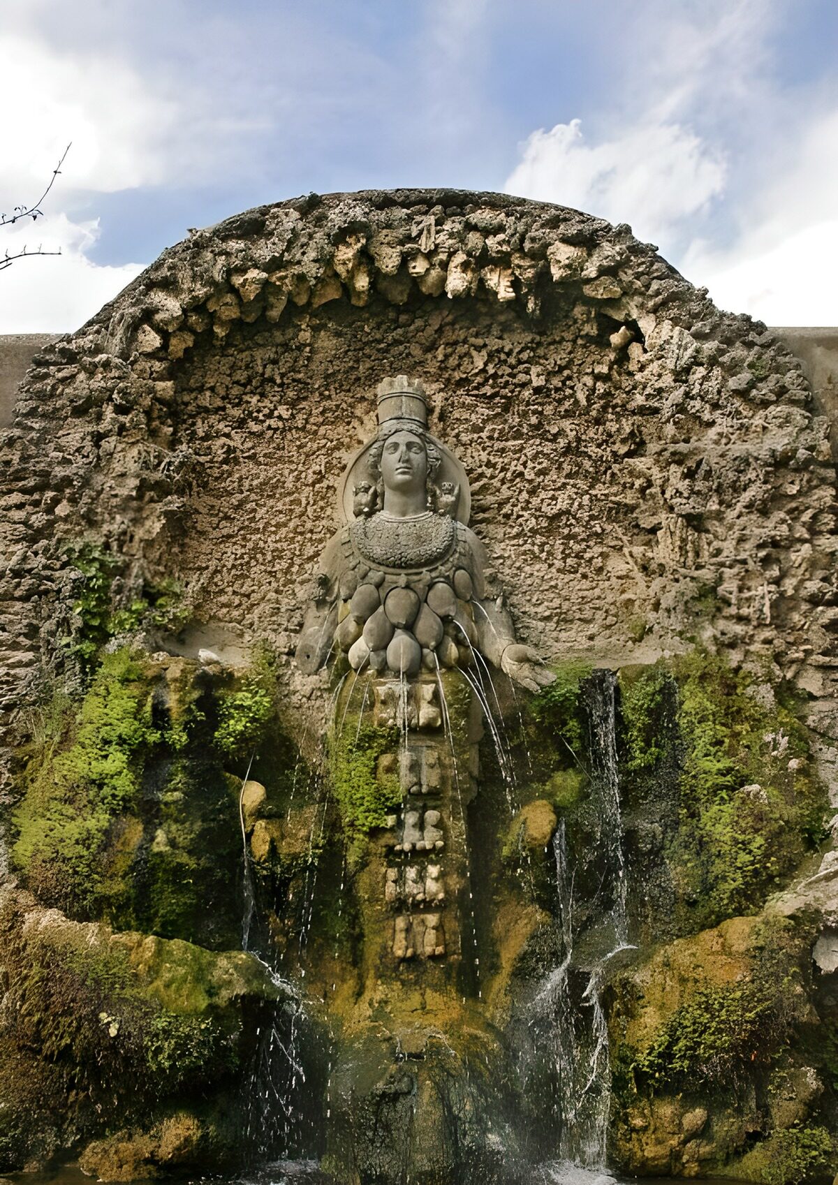 Weathered fountain with a female figure