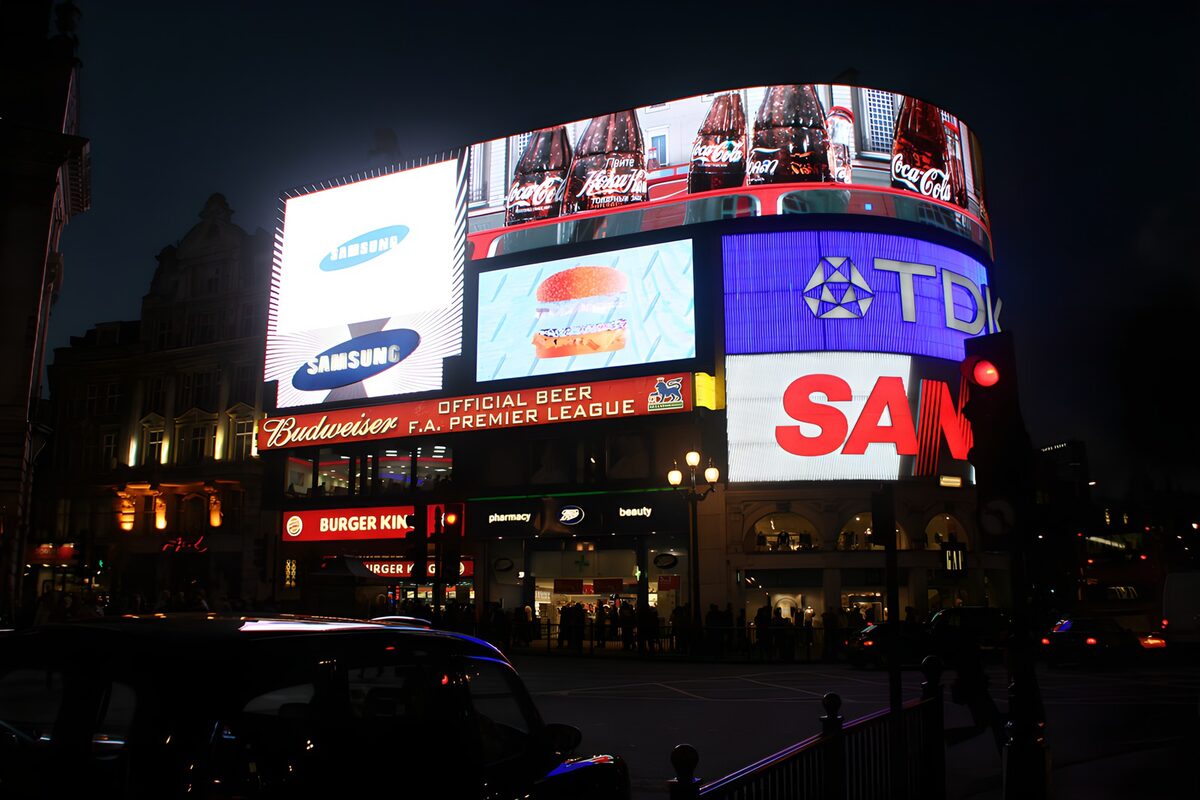 Bright billboards on a London night