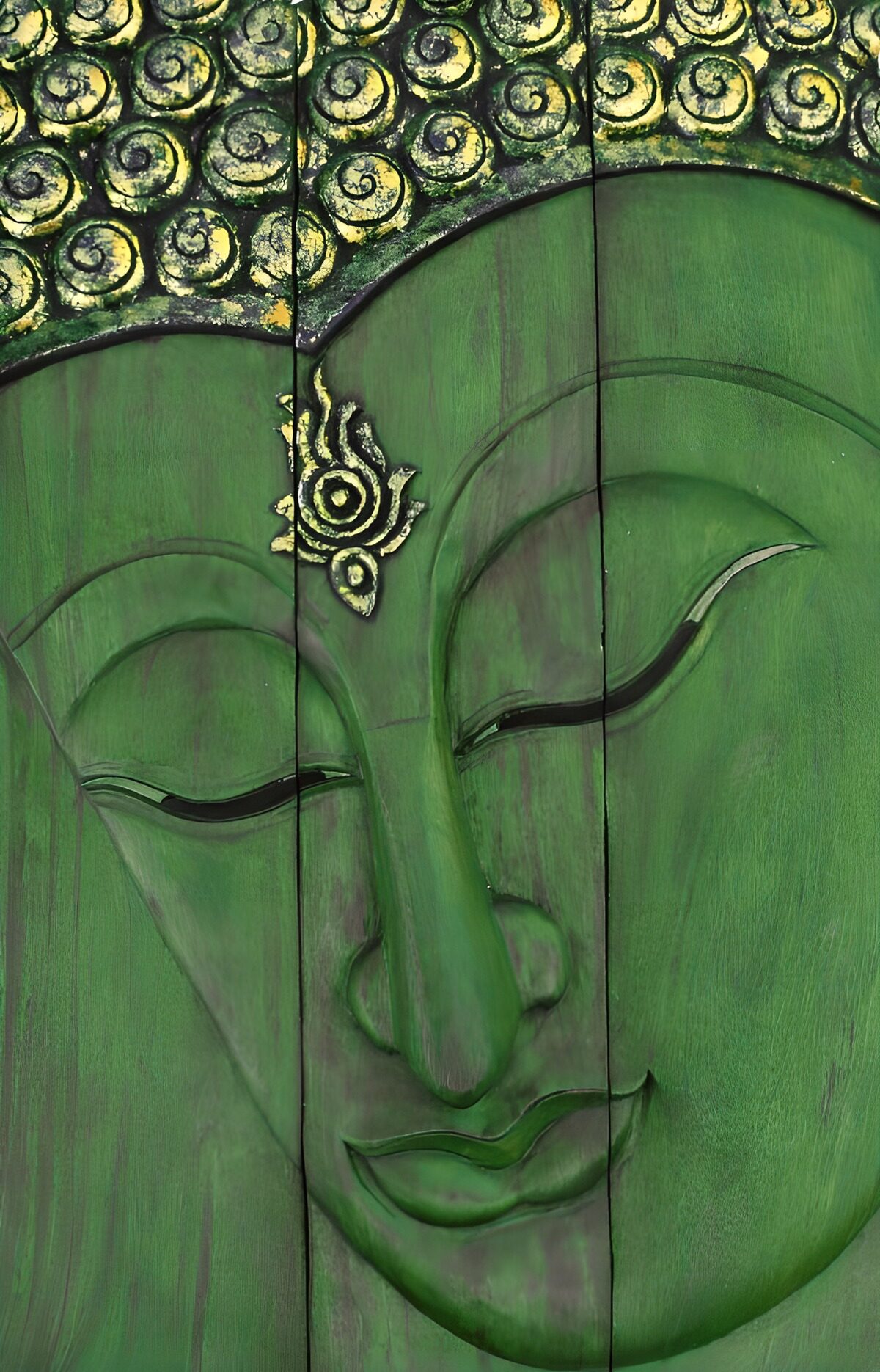 Green and gold Buddha in quiet repose