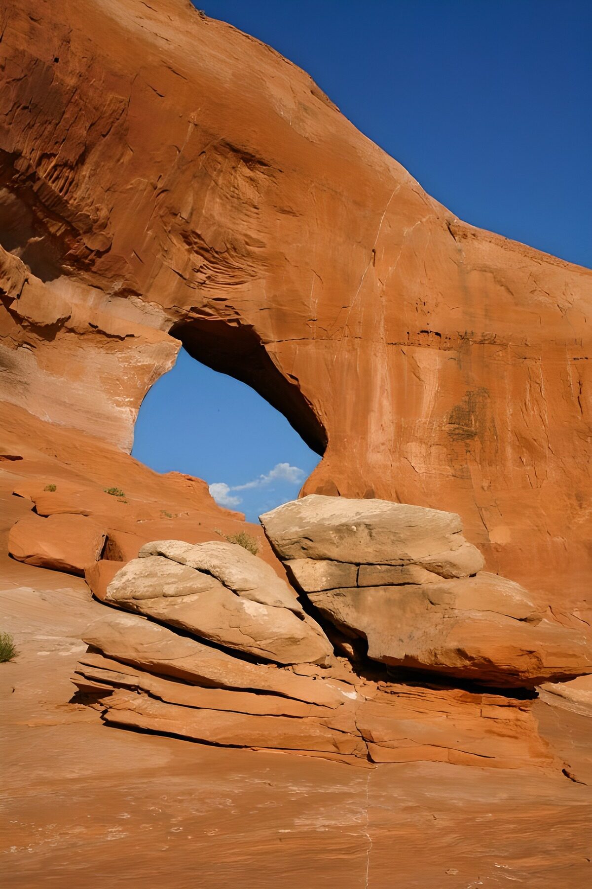 A sandstone arch holding a piece of sky