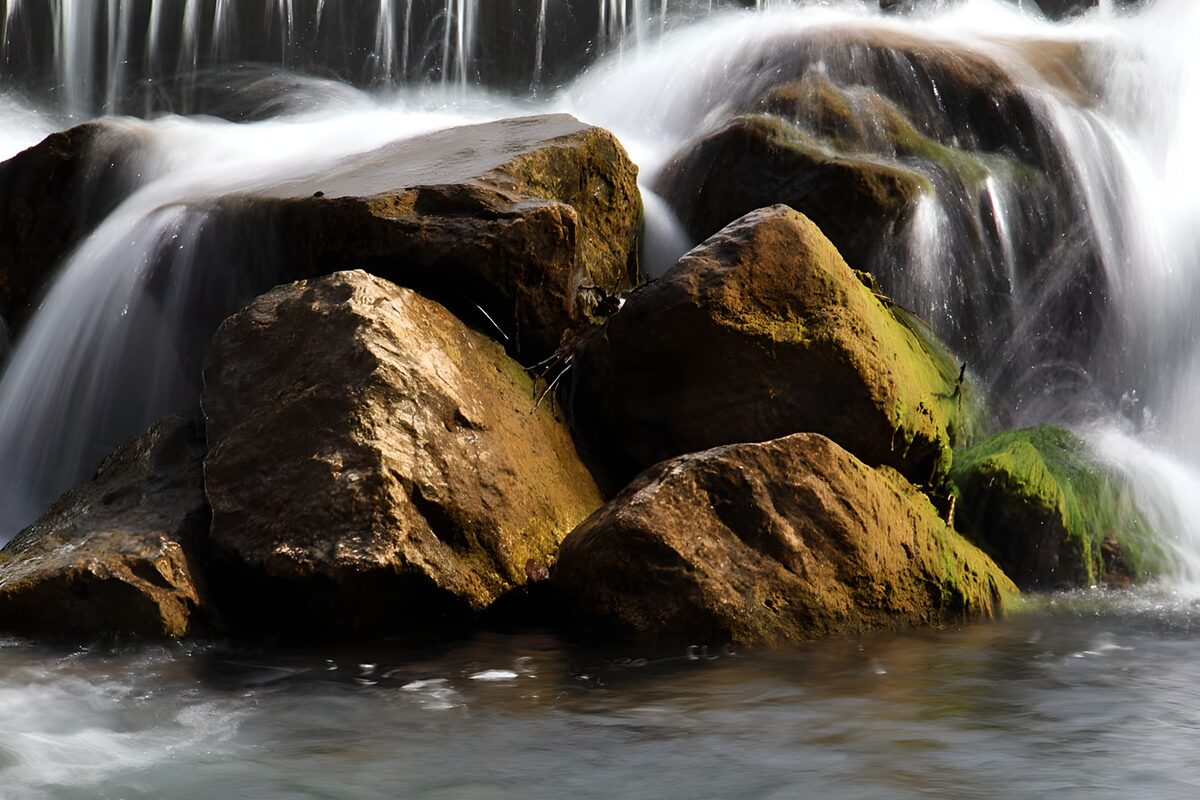 Soft cascades over rugged rocks
