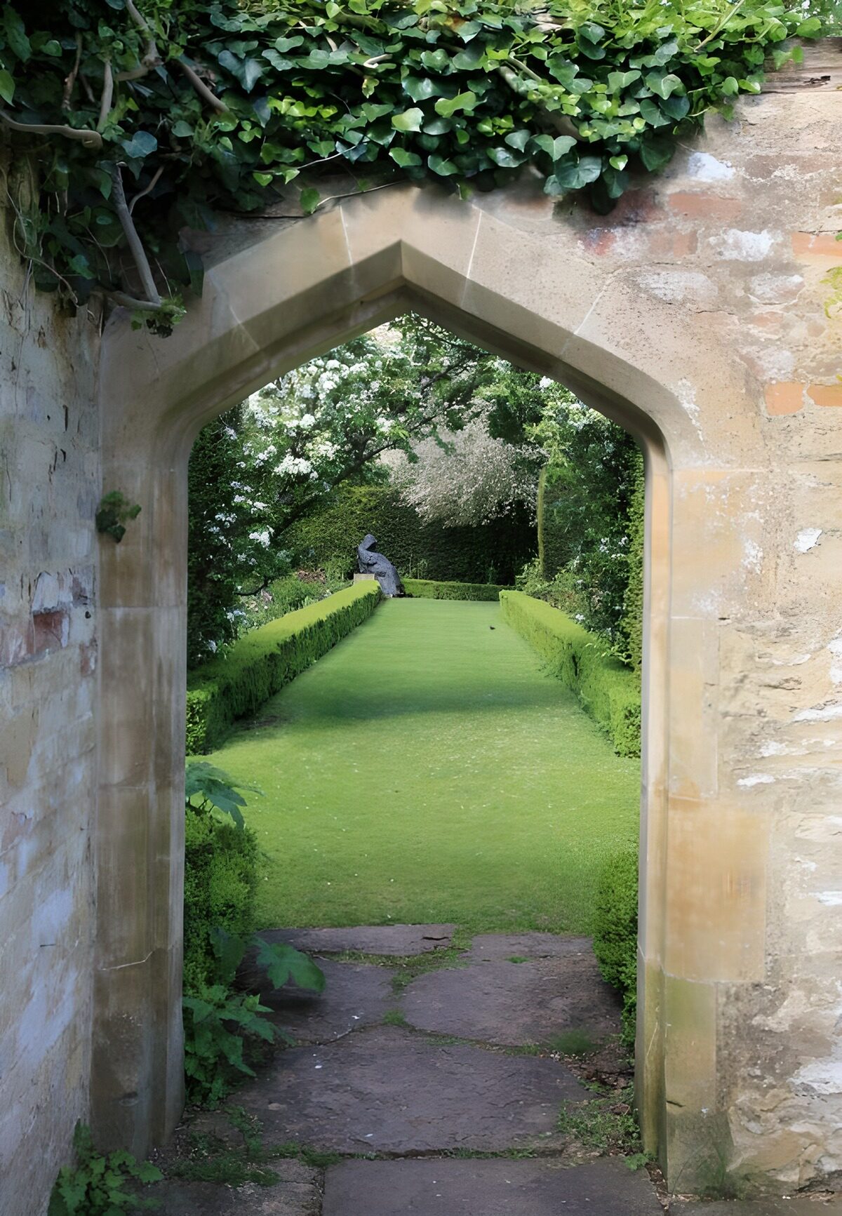 Stone archway into a secluded garden