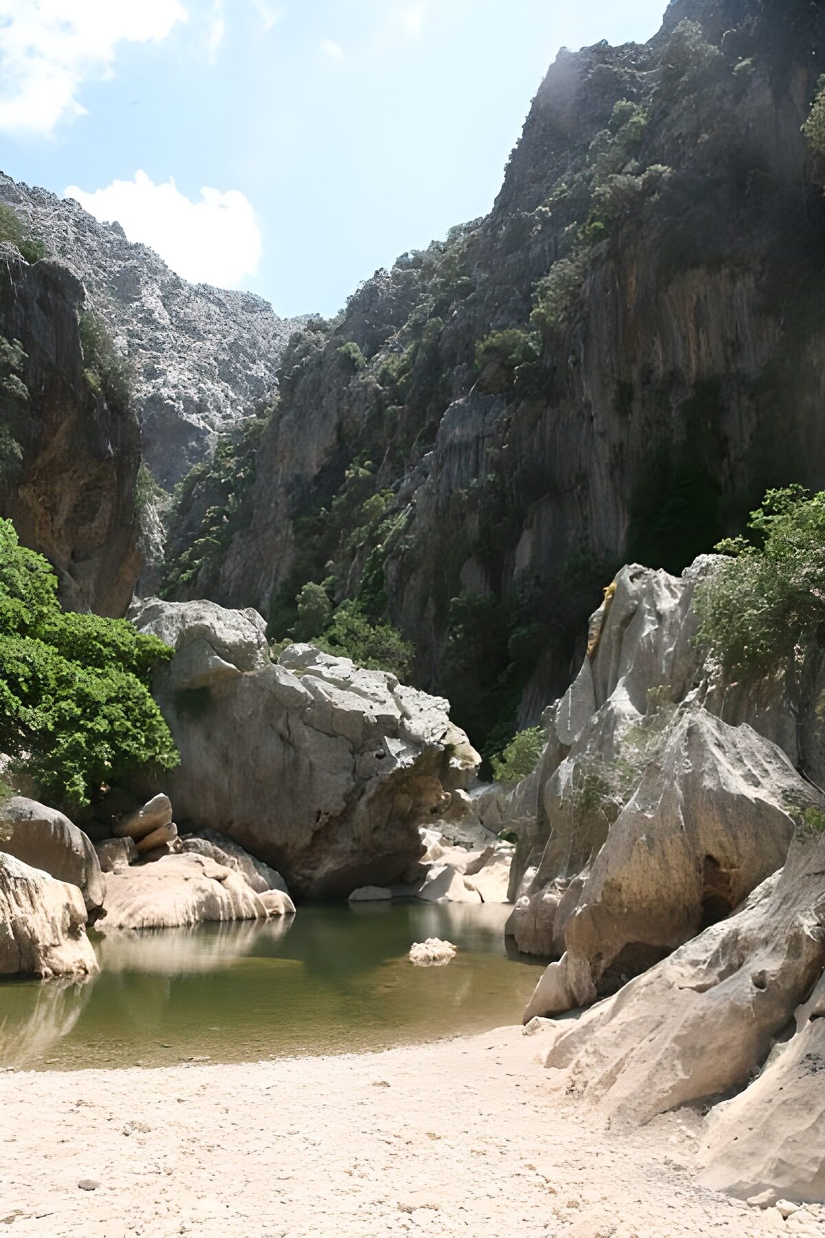 Rocky gorge with a quiet green pool