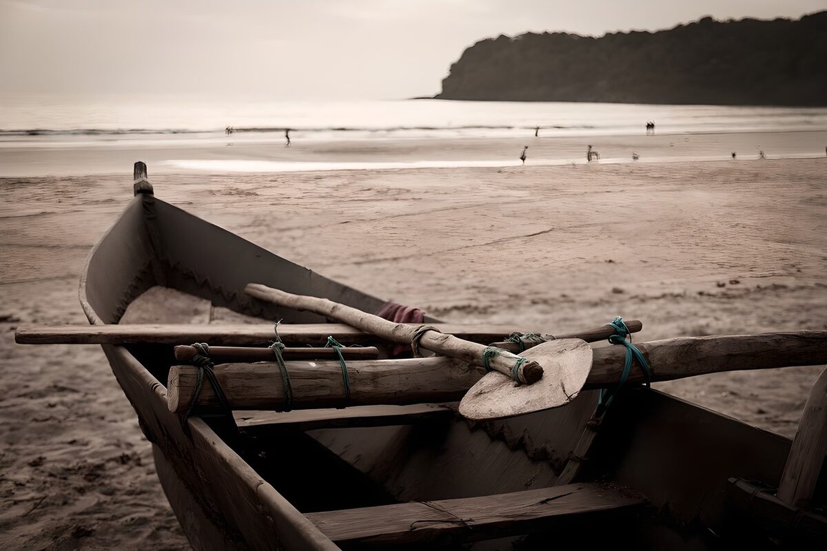 Weathered wooden boat on a quiet beach