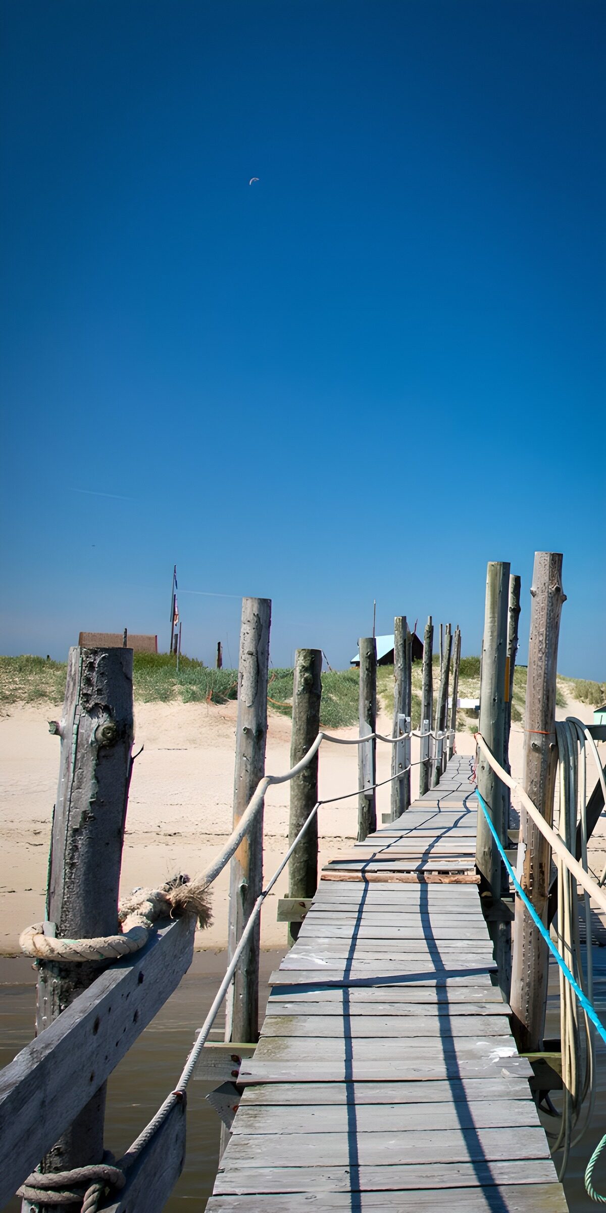 A wooden path to the quiet shore