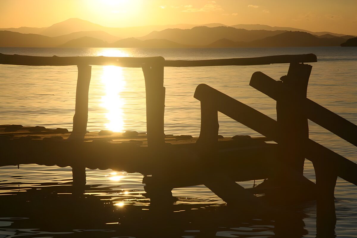 Wooden pier in the evening glow