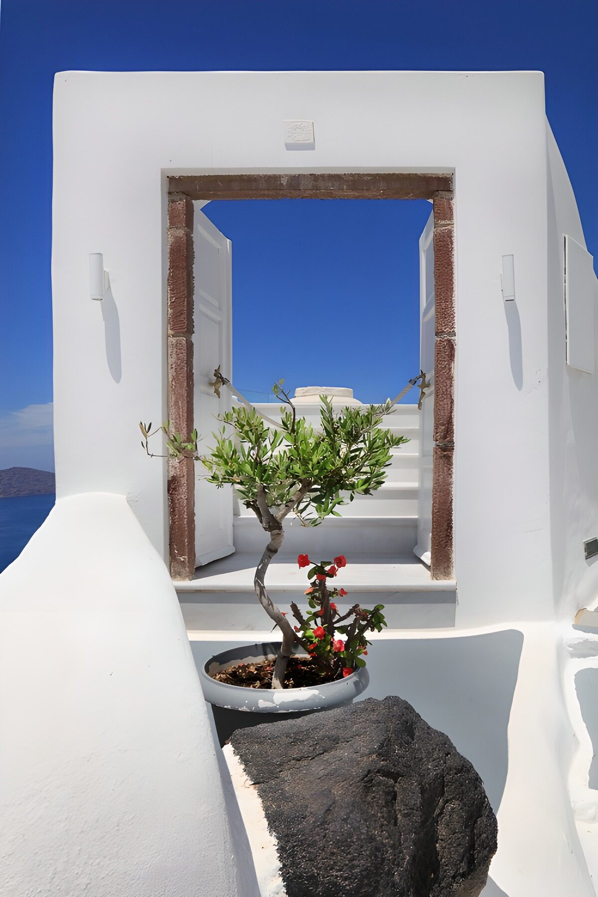White doors and steps in the sunshine