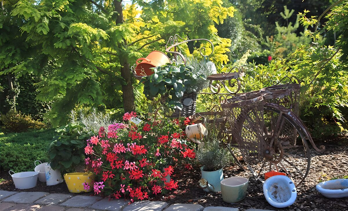 Rustic bicycle stand among summer flowers