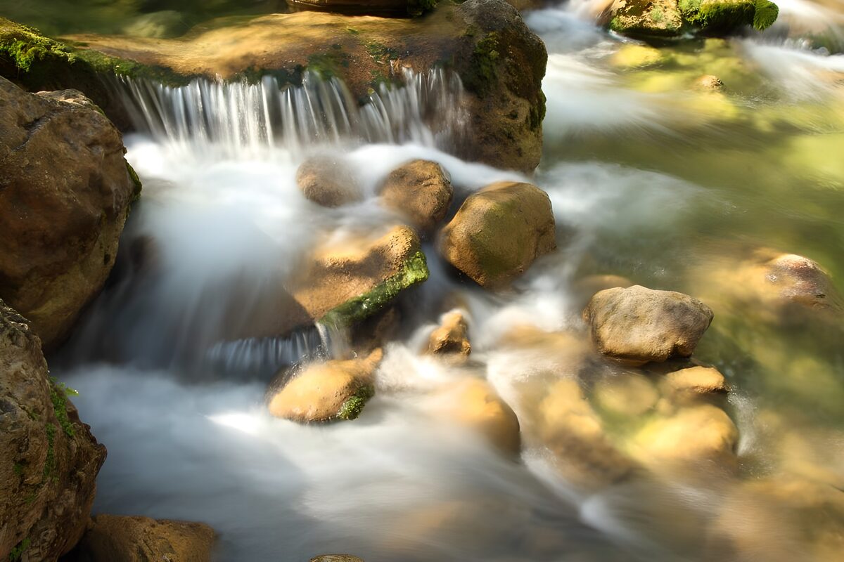 A gentle cascade over mossy rocks