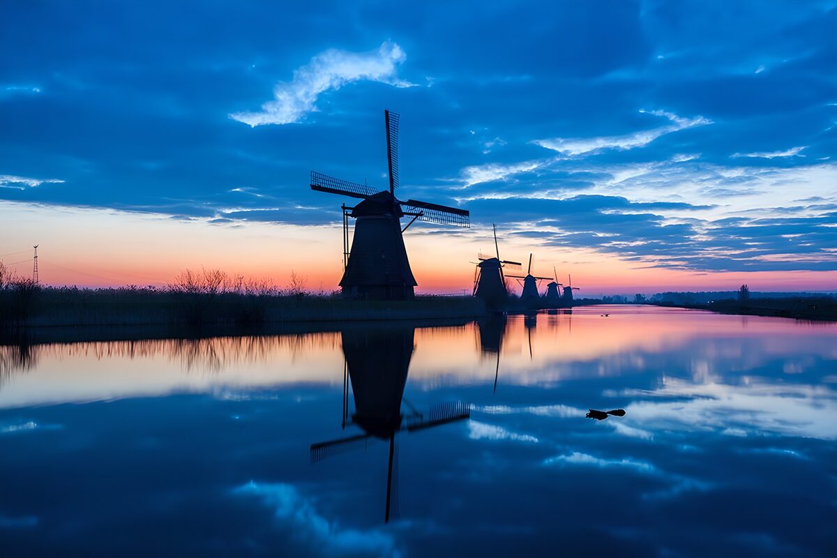Windmills reflected in twilight