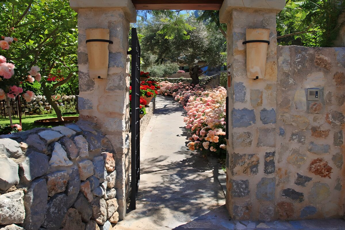 Where the garden gate lets summer in
