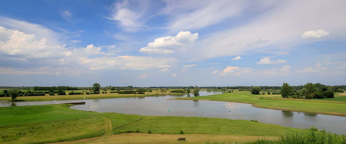 Golf course by the water on a quiet day